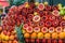 A beautifully designed fruit counter of a fresh juice vendor`s shop on the streets of Istanbul. A group of oranges on display in
