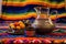 beautifully detailed moroccan teapot and glasses on colorful rug