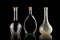 Beautifully illuminated decanters on a black background