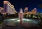 Beautifully illuminated fountains and Caesar`s Palace resort and casino