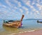 Beautifully native boat Longtail in beach sand