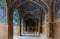 Beautifully ornamented arcade in historical Shah Mosque on south side of Naghsh-e Jahan Square, Isfahan