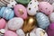 Beautifully painted Easter eggs as background, top view