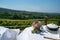 Beautifully prepared table overlooking vineyards in Piedmonte region, Italy