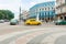 Beautifully restored Hotel Telegrafo across intersection of Paseo de MartÃ­, surrounded by dilapidated buildings with cars moving