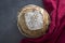 Beautifully scored sourdough bread on a table