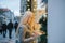 Beautifulwoman next to a shop window in the Christmas holidays.