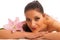 Beautifulyoung woman having a rejuvenating massage in a wellness