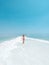 Beautigul girl in swimming suit on Dead sea salt crystals formation coastline, clear cyan green water at Ein Bokek beach, Israel