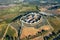 Beautiul aerial view of Monteriggioni, Tuscany medieval town on the hill. Tuscan scenic landscape vista with ancient walled city