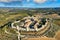 Beautiul aerial view of Monteriggioni, Tuscany medieval town on the hill. Tuscan scenic landscape vista with ancient walled city