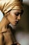 Beauty african woman in shawl on head, very elegant look with gold jewelry