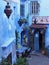 Beauty arabic alley in african Chefchaouen city in Morocco - vertical