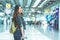 Beauty Asian woman traveling and holding suitcase in the airport