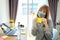 Beauty asian woman wearing mask showing post it the message is fighting covid