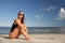 beauty athletic woman in a swimsuit on the beach