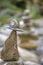 Beauty balancing pebbles from river stones stack.