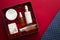 Beauty box subscription package and luxury skincare products, spa and cosmetic body care product flat lay on red