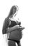 Beauty brunette pregnant woman isolated black and white portrait, tenderness people concept