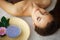 Beauty and Care. Spa Salon. Girl With Towel on the Head. The Woman With Pure Skin Lays On The Massage Tables And Relaxes. Skin Ca