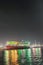 the beauty of the colorful lights of ships in the harbour