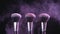 Beauty concept. Cosmetic brushes with pink cosmetic powder spreading on black background in slow motion