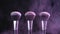 Beauty concept. Cosmetic brushes with pink cosmetic powder spreading on black background in slow motion