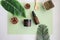Beauty cosmetic skincare background .Products with flower ,leaves on table top view, flat lay.