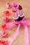 Beauty cosmetics: lipsticks, bow and flowers