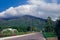 Beauty Country Road Side View and mountain in clouds background