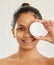 Beauty is a deeply personal journey. young woman posing with facial moisturiser at home.