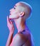 Beauty doesnt have to follow rules. Studio shot of an attractive young woman wearing edgy makeup against a blue