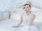 Beauty emotional blond bride in luxury interior