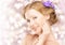 Beauty face young beautiful healthy girl with purple and lilac flowers