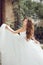 Beauty fashion bride girl gamboling with wedding blowing dress,