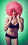 Beauty fashion. Fitness woman smiling, athletic body, afro
