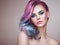 Beauty fashion model girl with colorful dyed hair