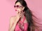 Beauty fashion model girl in sunglasses with bright makeup, long