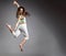 Beauty girl dance on grey background