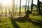 Beauty girl in hat at golf field at sunset laying on grass. lifestyle people concept