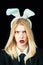 Beauty girl. Young girl easter woman in bunny ears. Beautiful young woman with bunny ears and blank poster on black