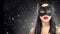 Beauty glamour brunette woman wearing carnival dark mask, party over holiday black background