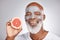 Beauty, grapefruit or happy old man with face mask marketing or advertising skincare or healthy diet. Studio background