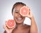 Beauty, grapefruit and skincare with portrait of black woman in studio for natural, cosmetics or vitamin c. Nutrition