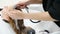 Beauty and hairstyle concept. Hairdresser washing woman ginger hair. Closeup shot of woman having her hair washed in