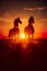 Beauty of horses\\\' silhouettes against an abstract sunset. The scene is both dramatic and serene