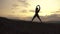 Beauty of human body. African american bodybuilder stretching at sunset during his outdoor training.