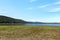 Beauty look toward picturesque Rabisha lake and mountain over Magura cave