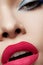 Beauty macro of woman with bright lips make-up, clean face skin