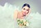 Beauty model bride in wedding dress with long train